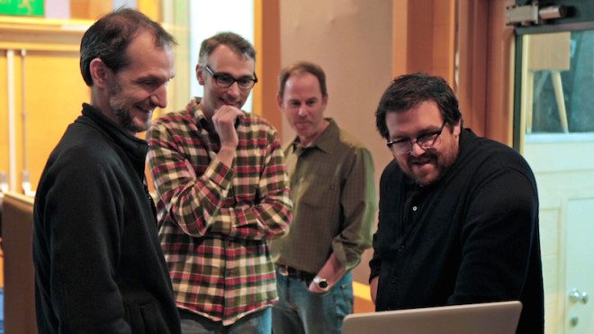 (L to R) Director Anthony Stacchi, Director Graham Annable, Producer David Ichiok and voice talent Nick Frost review a scene during production of LAIKA and Focus Features' family event movie The Boxtrolls, opening nationwide September 26th.
