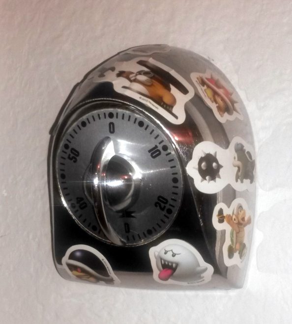 Decorate a kitchen timer with geeky stickers. Set it for a reasonable amount of quiet time.