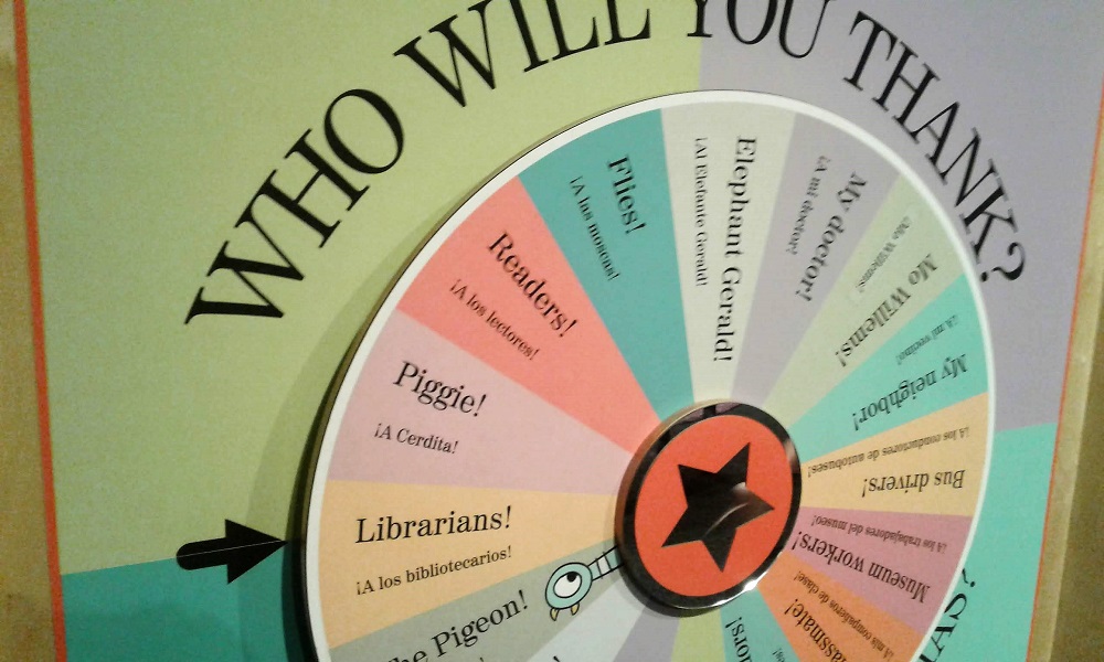 Large game wheel labeled "Who Will You Thank?" arrow pointing at "Librarians!" 