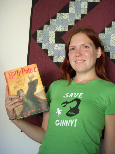 a photo of the author holding Harry Potter and the Deathly Hallows