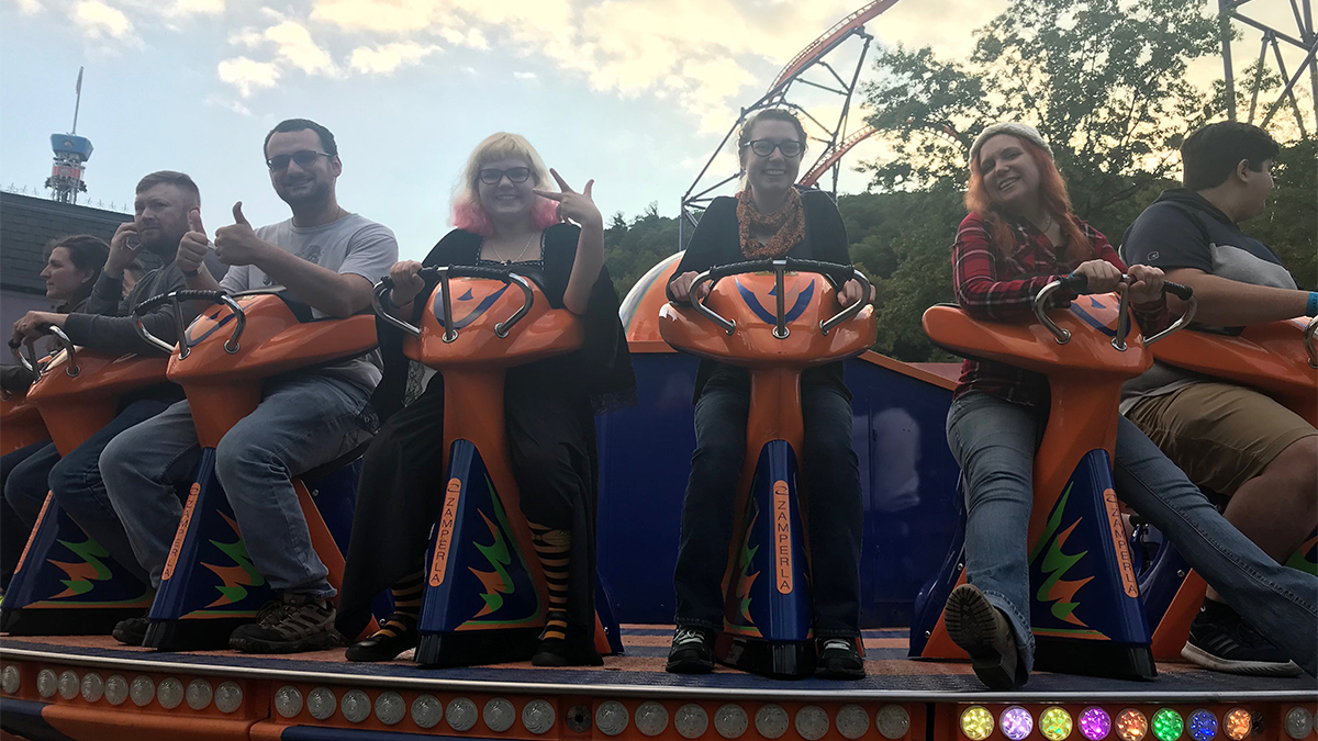 a photo of the author and her companions on the ride "Revolution"