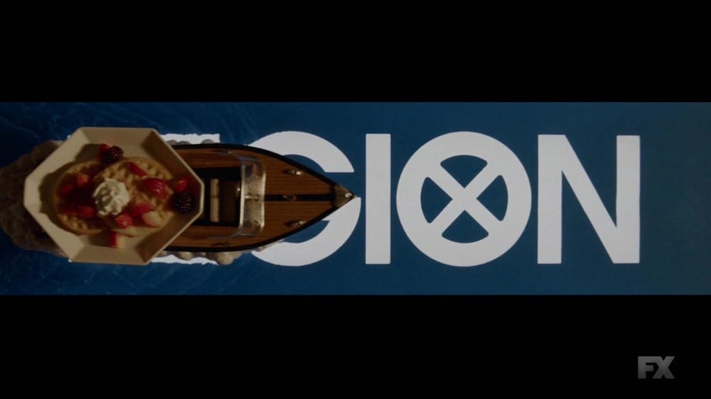 boat floating over the title word "Legion"