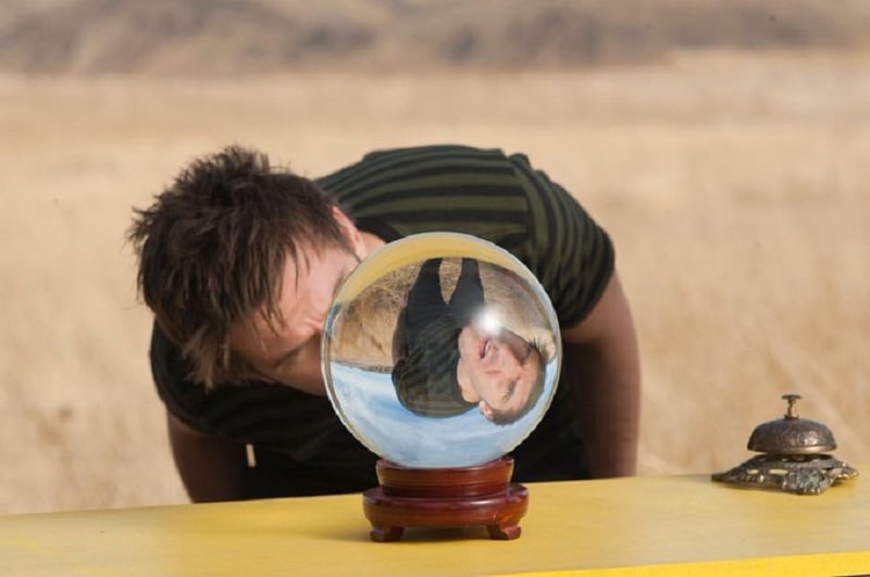 Dan Stevens as David Haller peering in a crystal ball