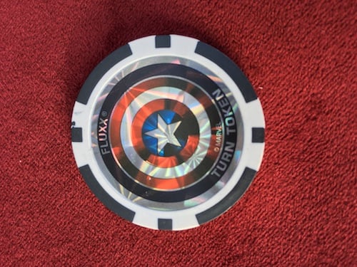 Turn coin in Marvel Fluxx
